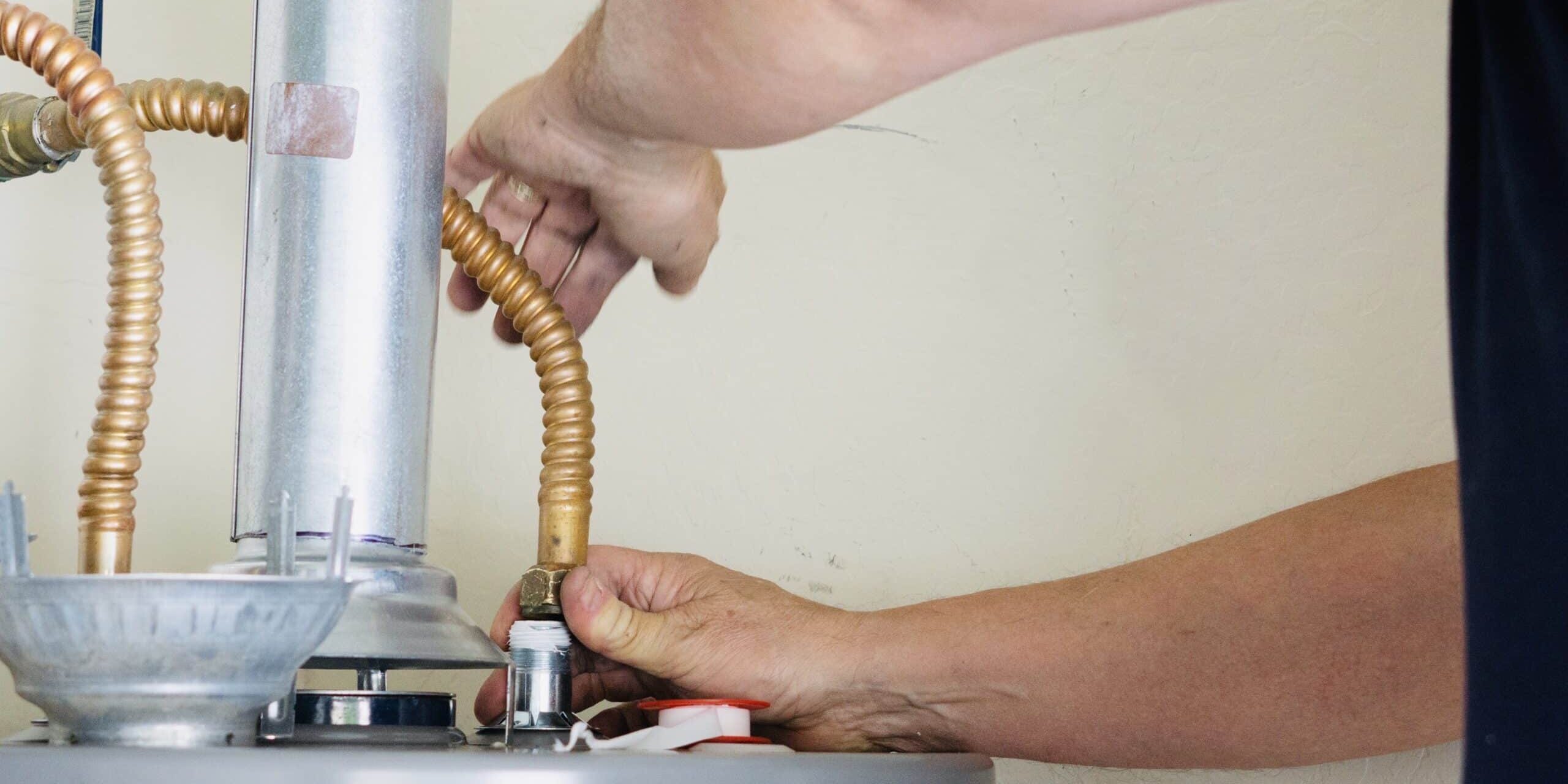 making adjustments during a hot water system replacement