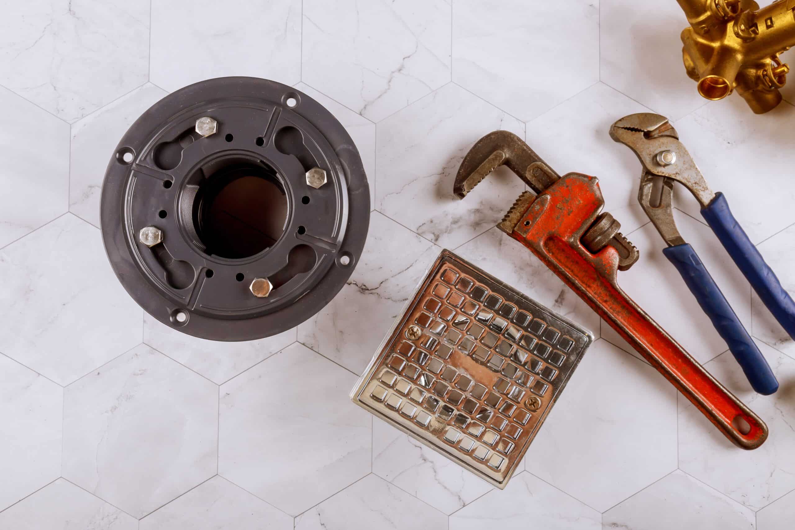 Dirty Stainless Steel Bath Shower Drain In Modern Style Plumbers Fixtures And Monkey Wrench